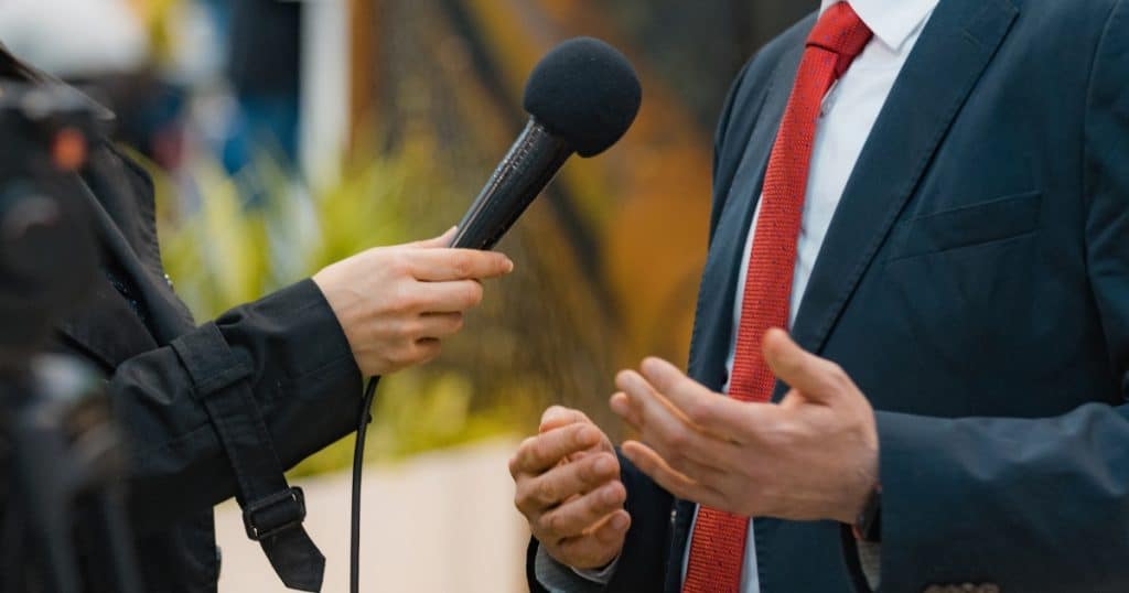 Man being interviewed for television